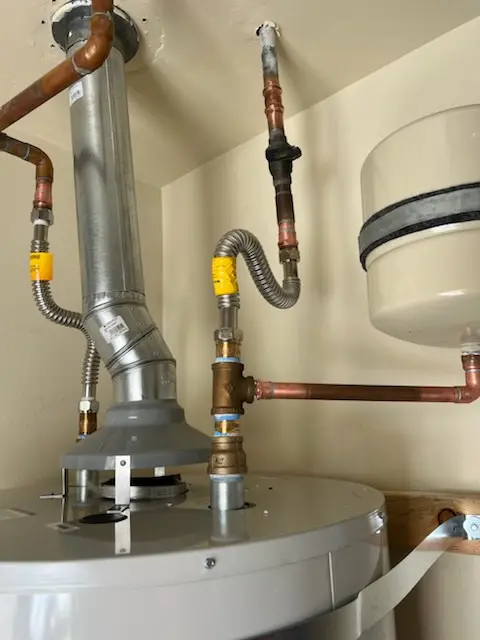 Water heater installation and plumbing repair in Elsa